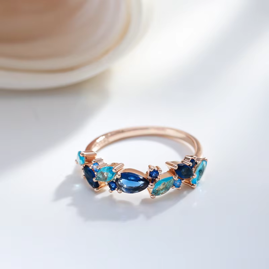 Bague en Or Rose avec Pierres Bleues Multiformes