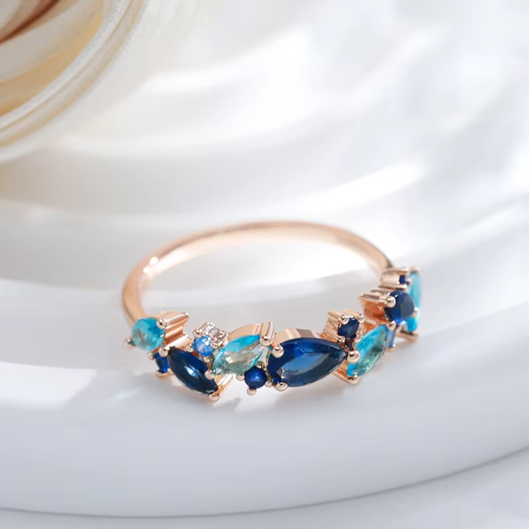 Bague en Or Rose avec Pierres Bleues Multiformes