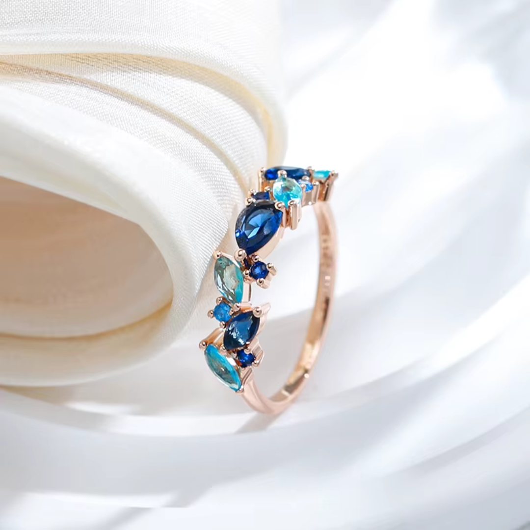 Bague en Or Rose avec Pierres Bleues Multiformes