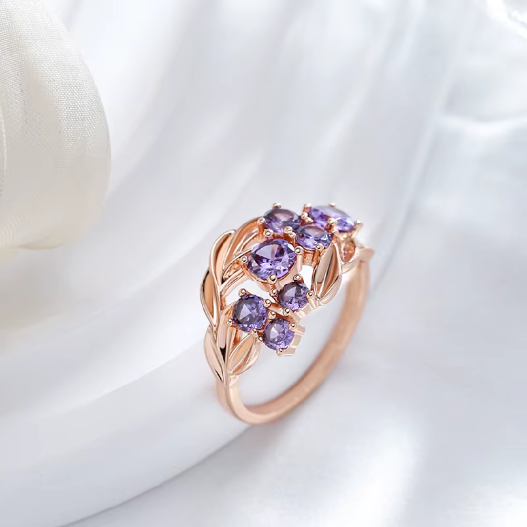Bague en Or Rose avec Pierres Violettes et Motif Feuillage