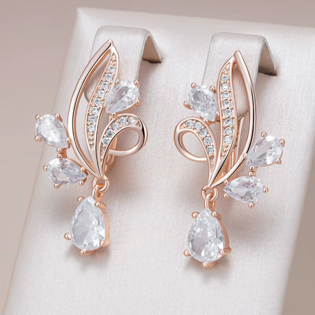 Boucles d'Oreilles Pendantes en Or Rose avec Cristaux Blancs