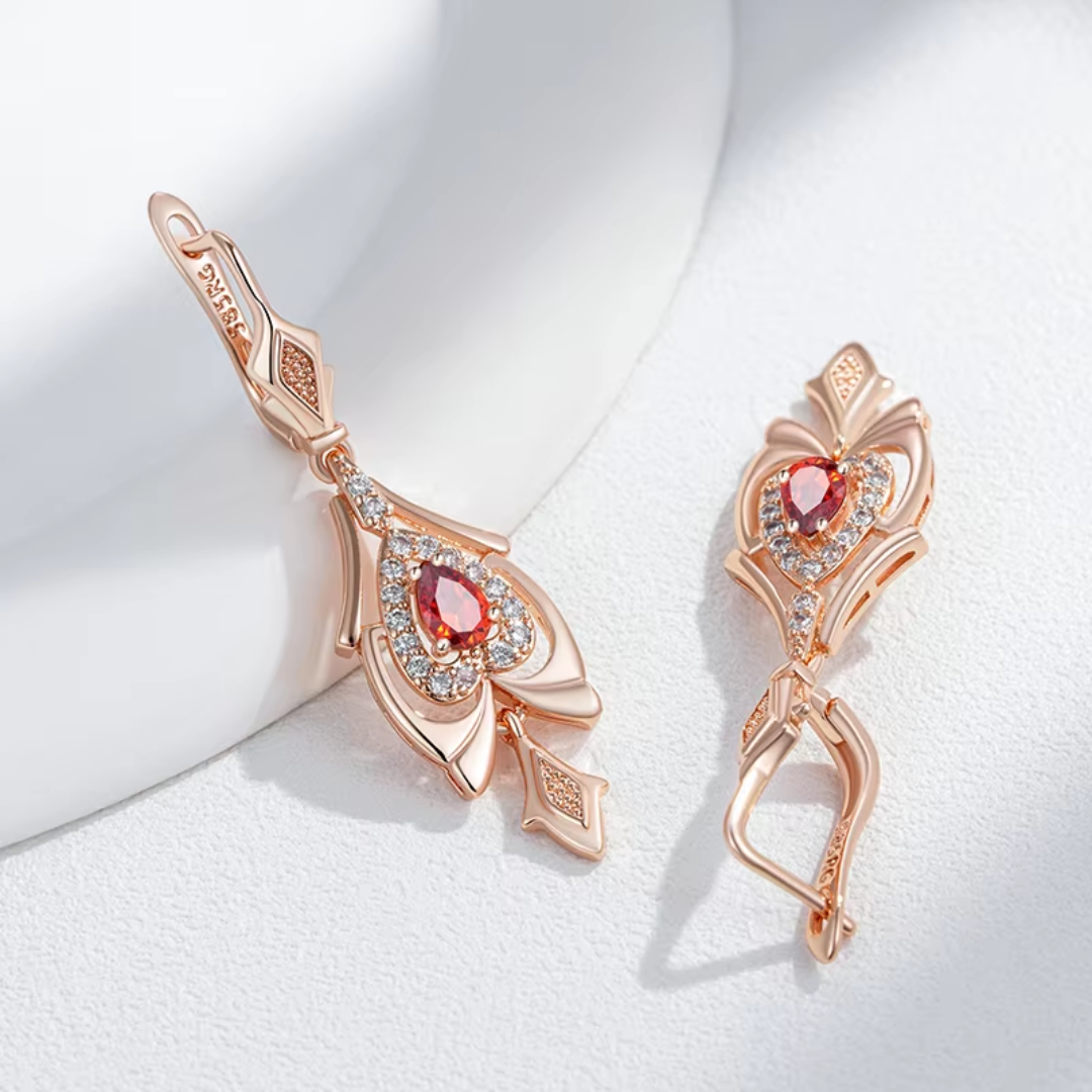 Boucles d'Oreilles en Or Rose avec Cristaux Goutte Rouges et Zircones