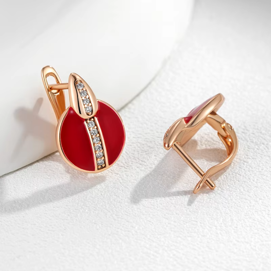 Boucles d'Oreilles en Or Rose avec Pierre Rouge et Détails Pavés