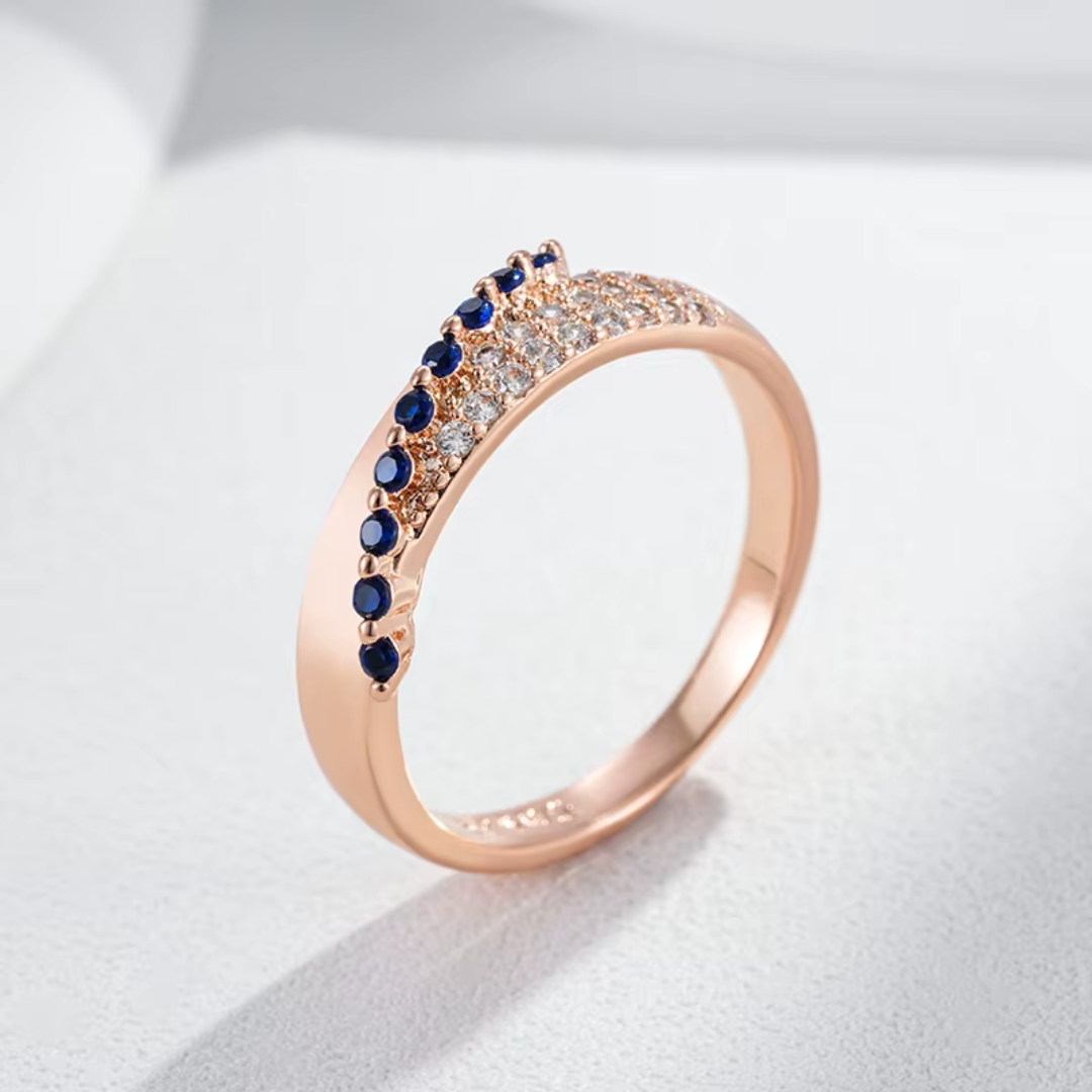 Bague en Or Rose avec Pierres Bleues et Cristaux Étincelants