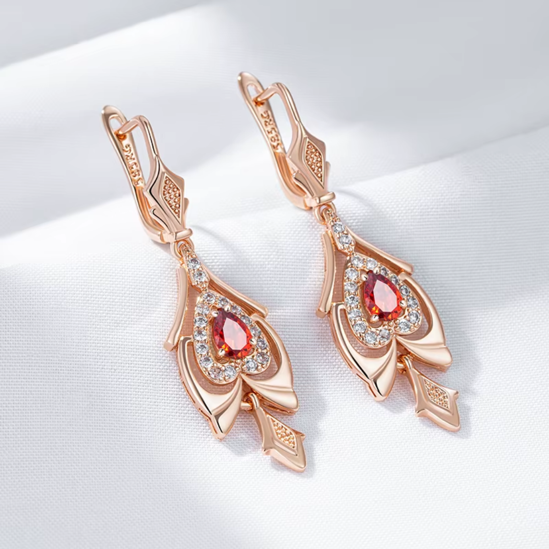 Boucles d'Oreilles en Or Rose avec Cristaux Goutte Rouges et Zircones