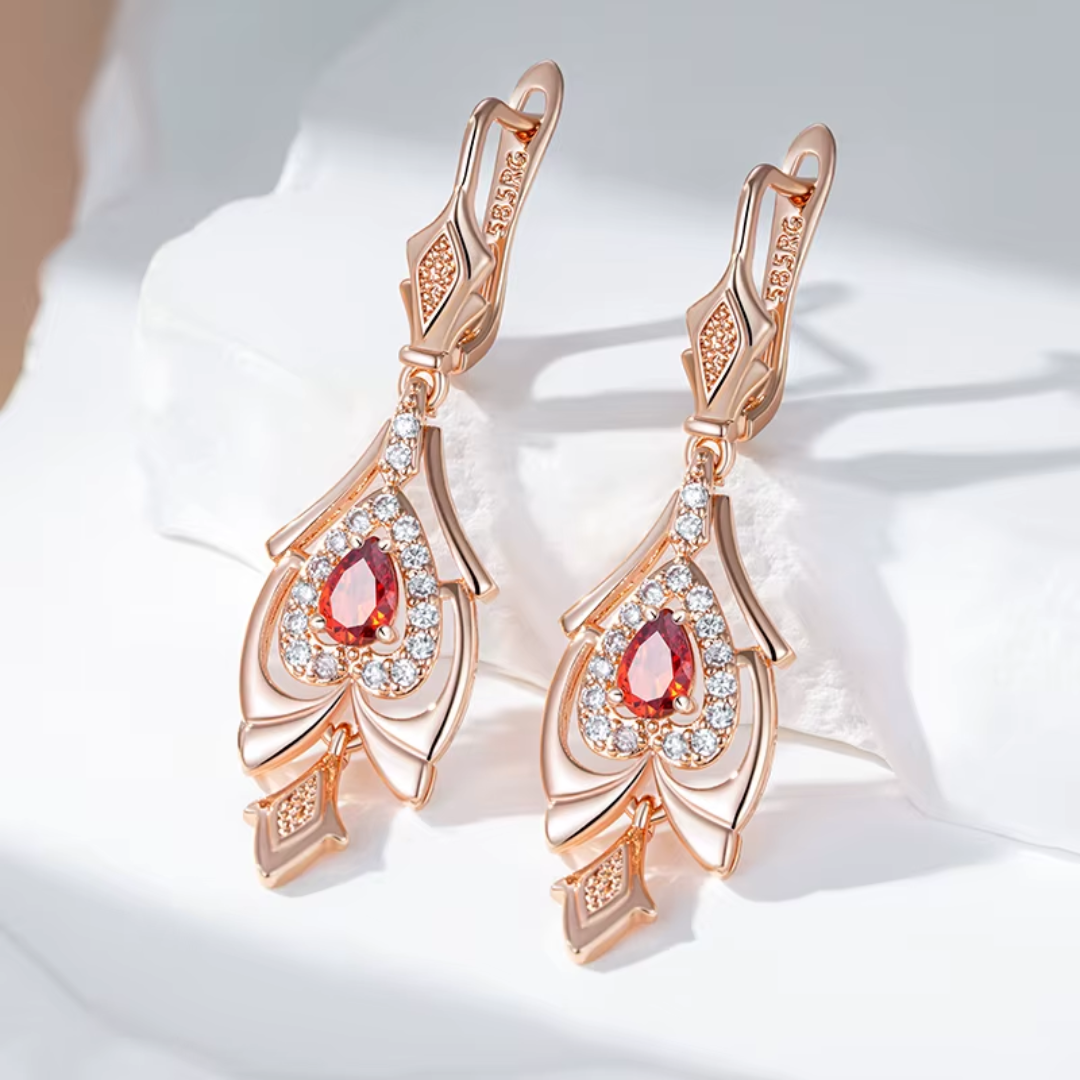 Boucles d'Oreilles en Or Rose avec Cristaux Goutte Rouges et Zircones