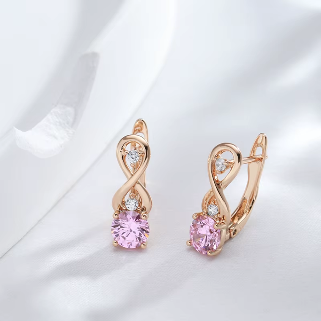 Boucles d'Oreilles en Or Rose avec Cristaux Roses et Détail Infini