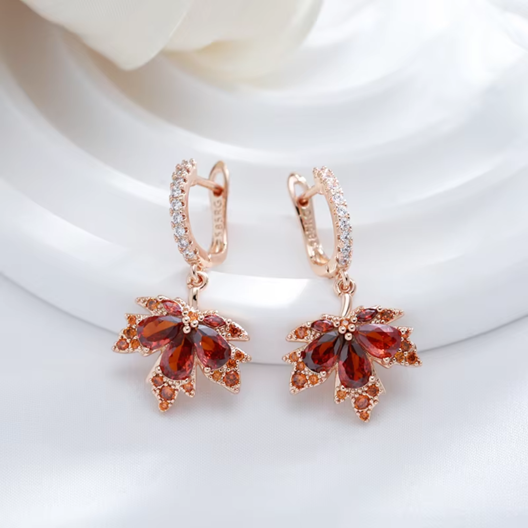 Boucles d’Oreilles en Or Rose avec Fleur de Cristaux Rouges