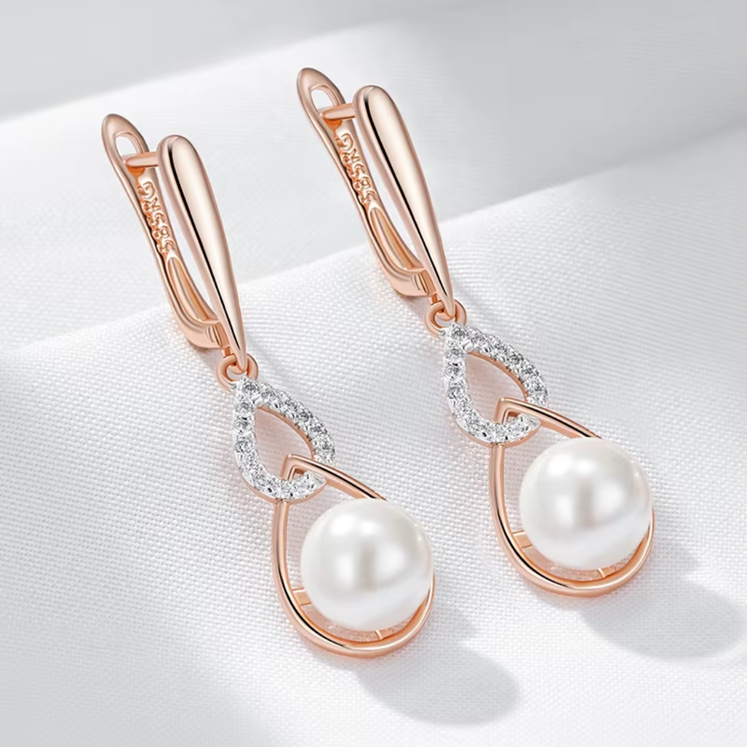 Boucles d'Oreilles en Or Rose avec Perle et Détails en Zircone