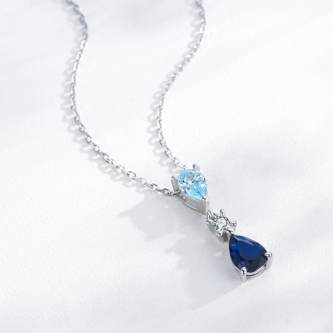 Parure en Argent avec Gouttes de Cristaux Bleus et Zirconias